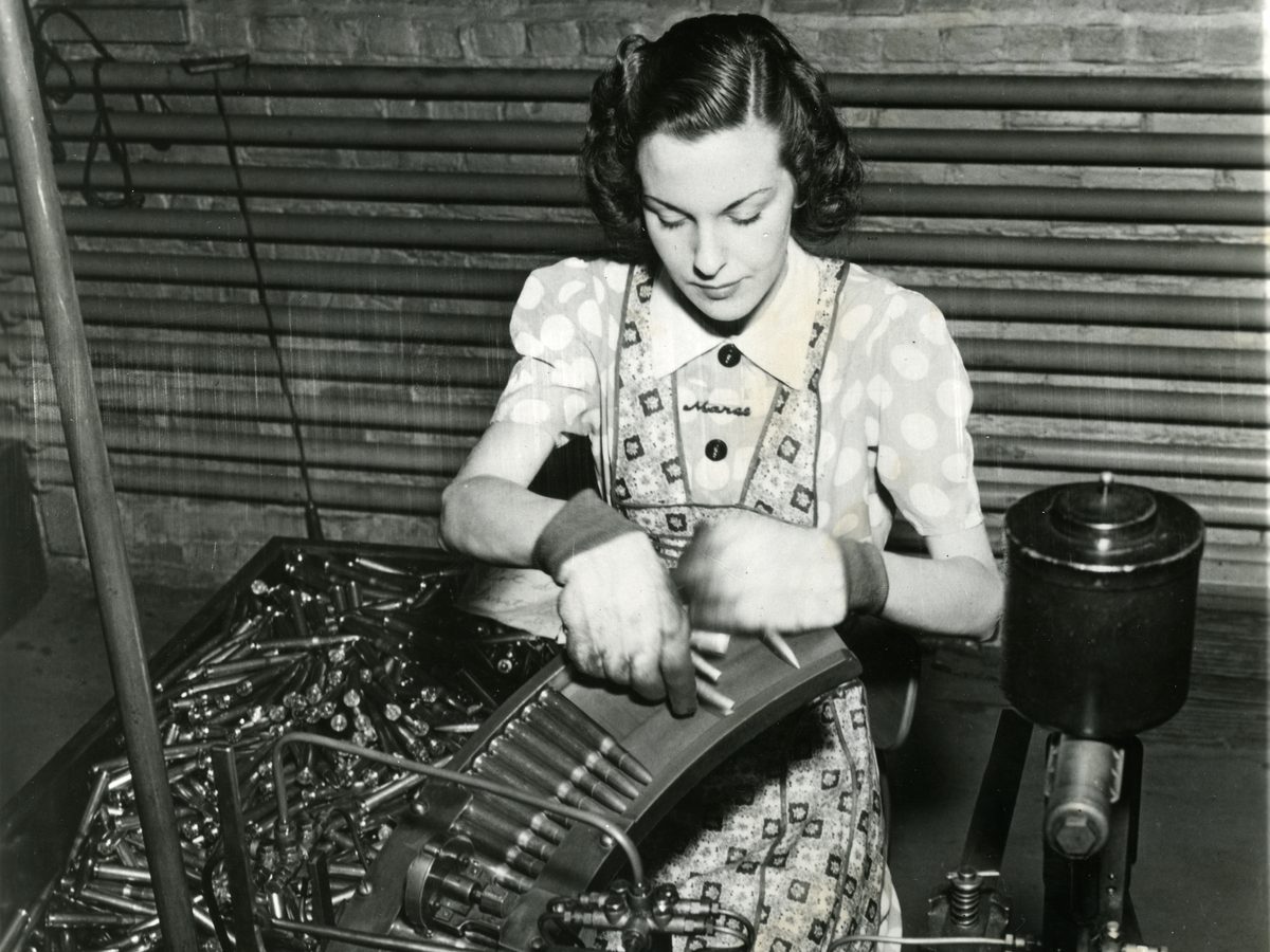 Worker gauging .50 caliber cartridges at the Army arsenal in Philadelphia in the early 1940s
